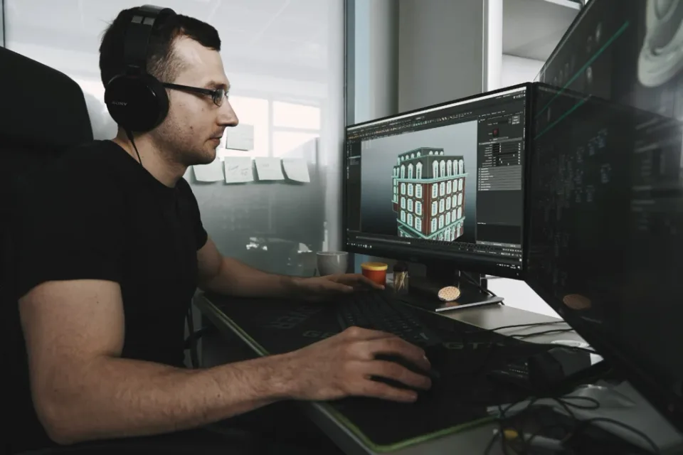 game developer creating 3D game environment